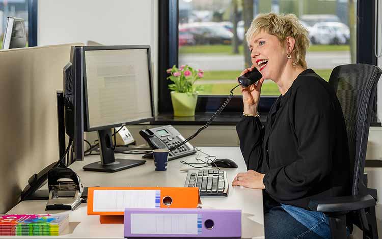 Woman on the phone smiling